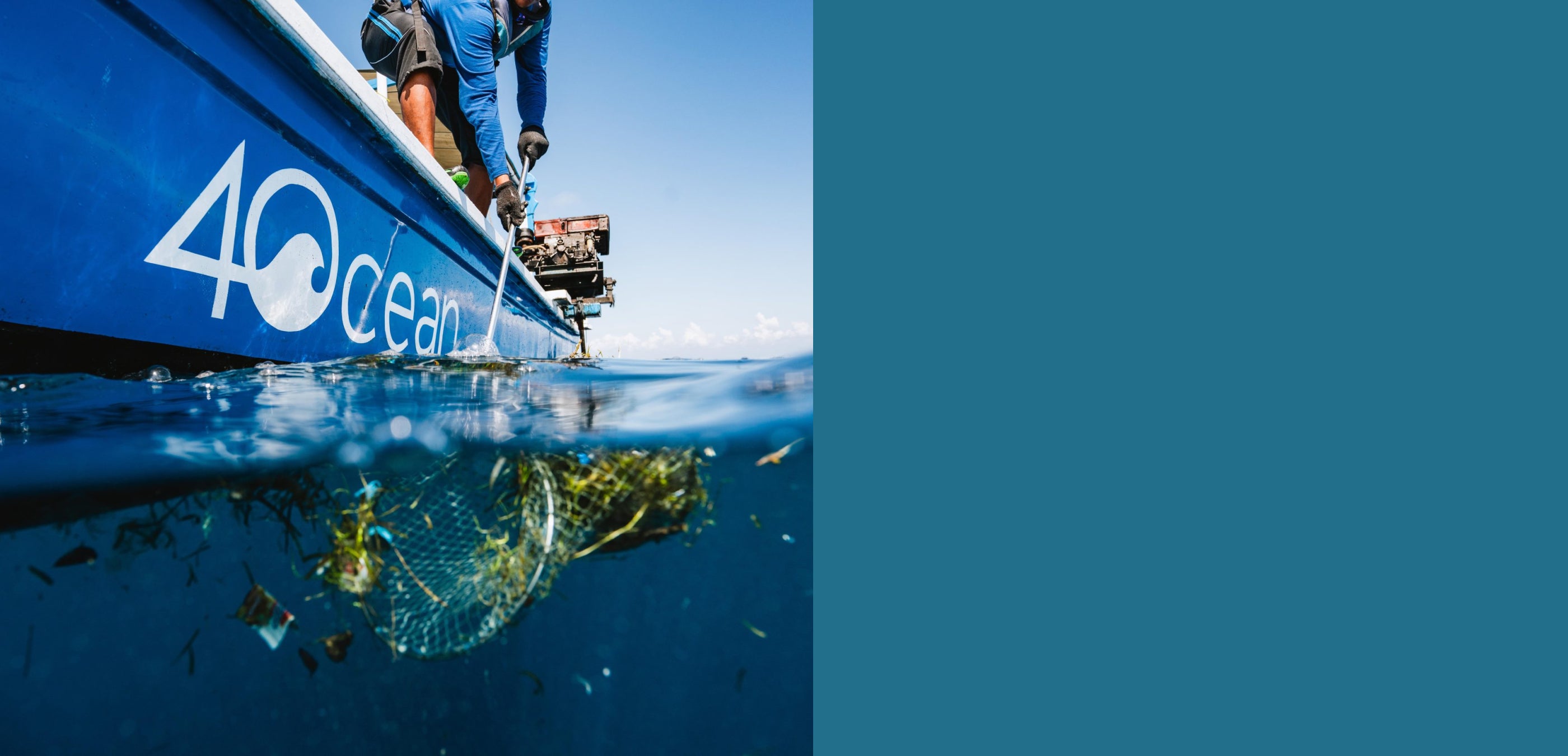 A photograph of a member of the 4Ocean charity fishing waste plastic out of the sea.